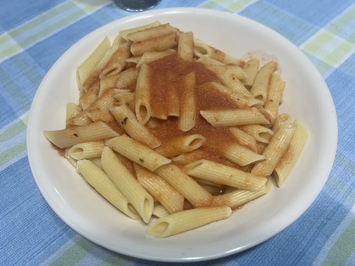 Pasta with napoli style tomato sauce, cooked by Ely